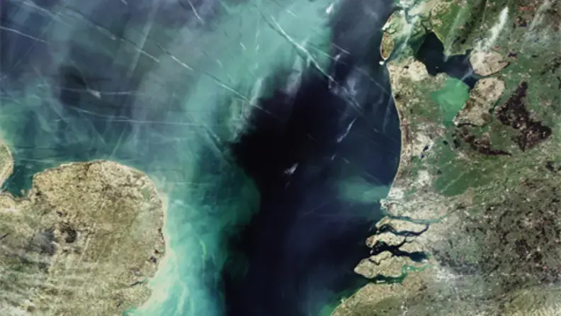 Contrail graffiti over the North Sea