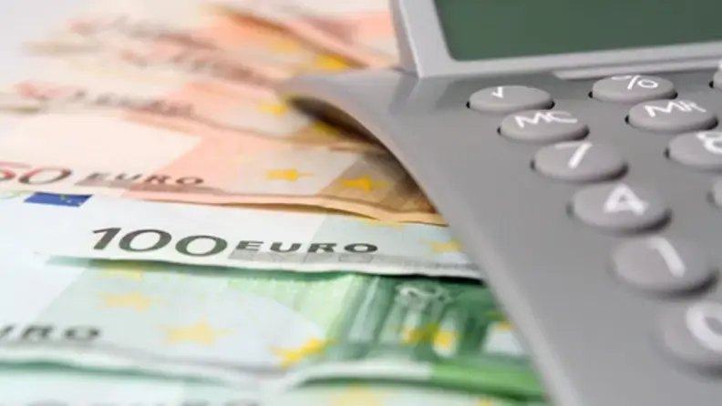 Billet et calculatrice